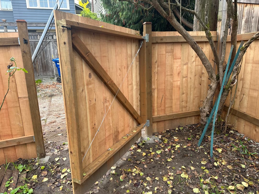 picture of a newly installed tall wooden fence