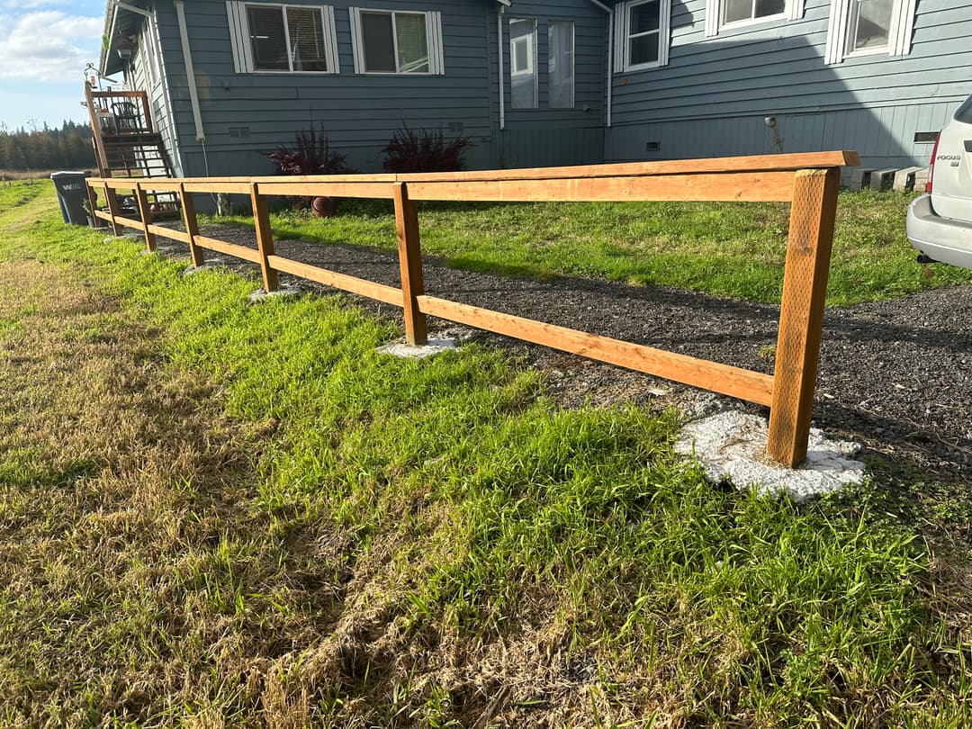 newly remodeled wooden backyard fence
