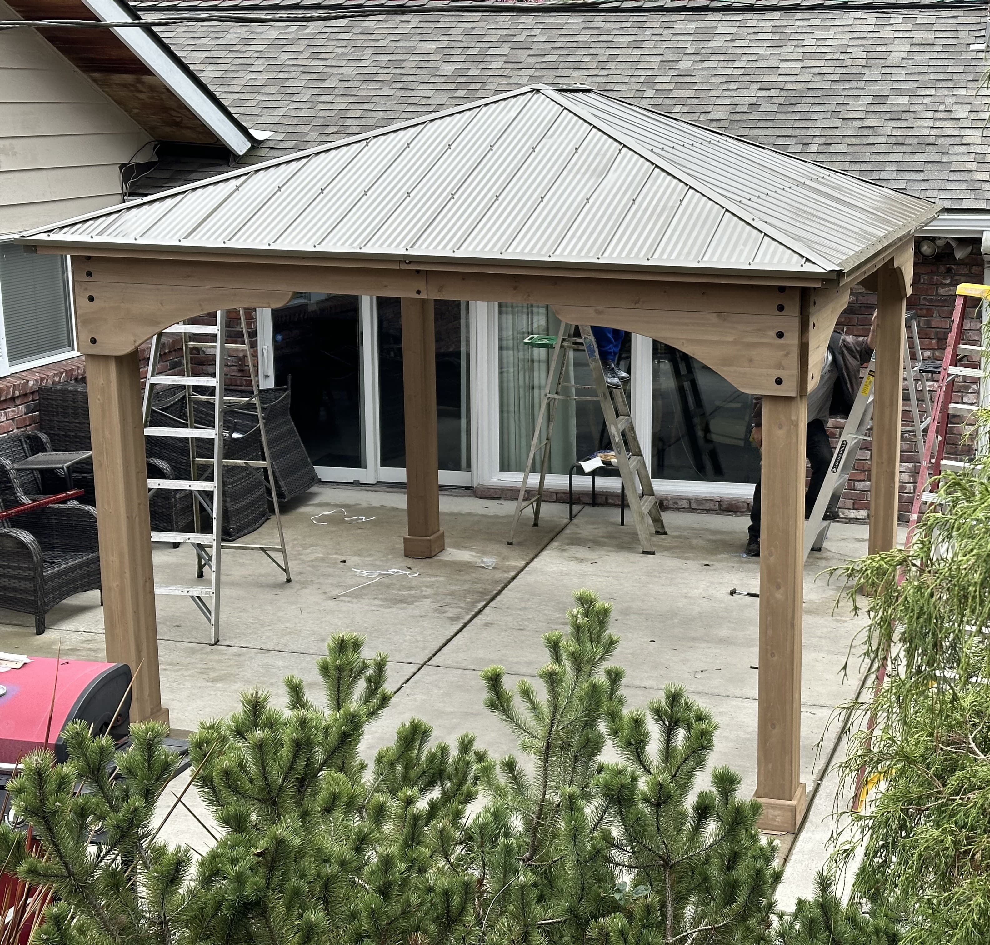 Picture of a newly remodeled concrete deck and steel patio cover