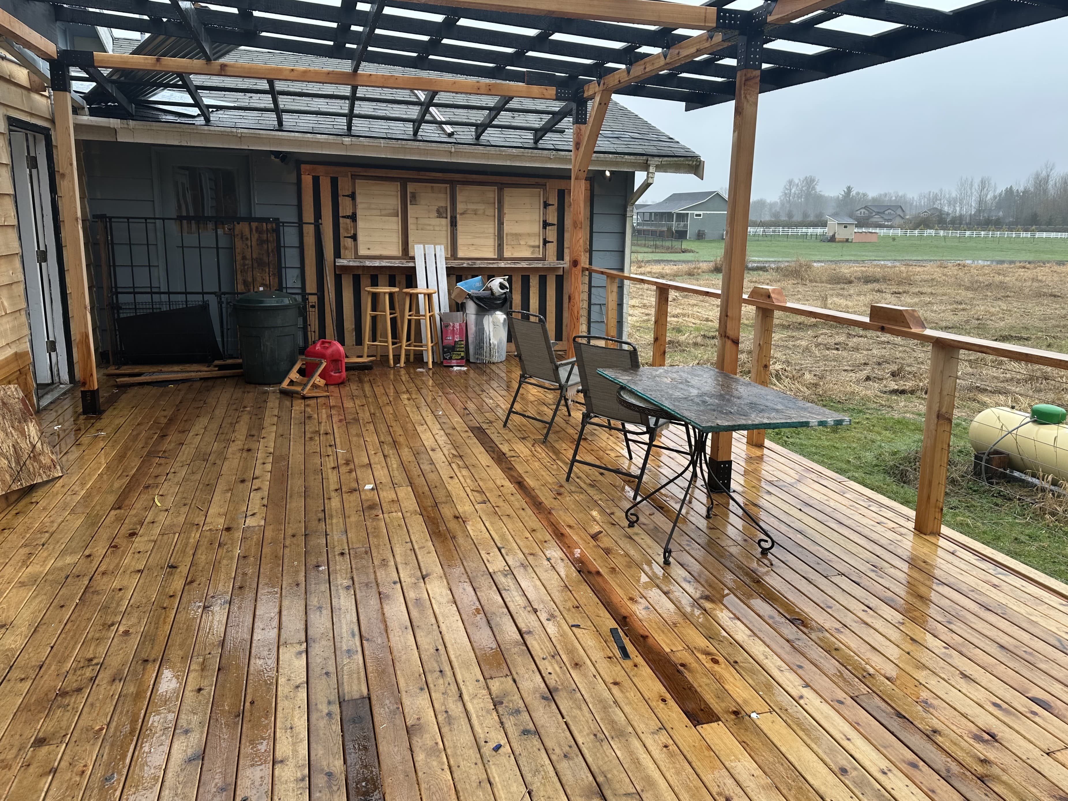Picture of a newly installed wooden deck and patio cover